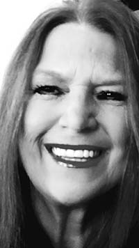 lori cooper - Inspirational Writer, Speaker, and Law Enforcement Advocate women posing for camera